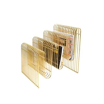 China Popular Silver Color Metal Gold Steel Wire Stocked Luxury Magazine Rack for sale