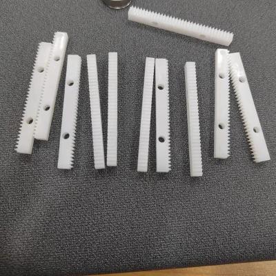 China Gear rack Ningbo factory customized injection molding injection pom M0.3 plastic gear rack for sale