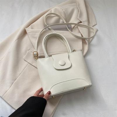 China Korean version of the new women's handbag of foreign women's fashion solid color style texture bucket bag casual cross shoulder bag - body bag for sale