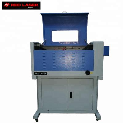 China Cheap Deep Marking Price Mini Mdf Wood Souvenirs 6040 CO2 Laser Cutting Engraving Machine for sale