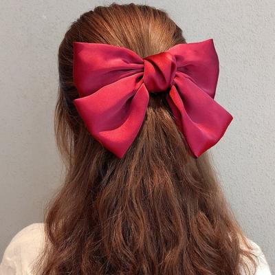 China Wholesale Sweet Accessories Korean Classic Hairpin Girls Style Bow Silk Main Red Hair Clip Large for sale