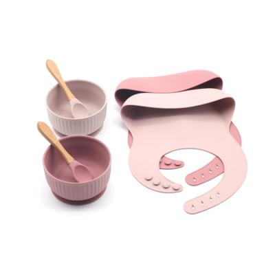 China New Textured Silicone Baby Feeding Dishes Sets Rolls Baby Food Bowl Porcelain Ceramic Dishes Tableware Silicon Place Mat And Dish Set for sale