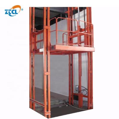 China Safety Easy Operation Convenience Large Tonnage Cargo Lift / Material Handling Equipment / Hydraulic Guide Rail Lift for sale