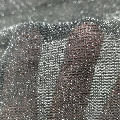 China Hot Sale Stretch Good Elasticity Nylon Spandex Silver Particle Tulle Fabric Suitable For Clothing Highly Breathable for sale