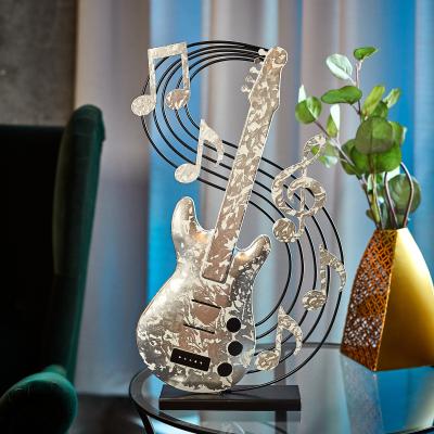 China Traditional Home Decor Iron Musical Instruments Guitar Shape Office Decoration Metal Home Standing Decoration for sale