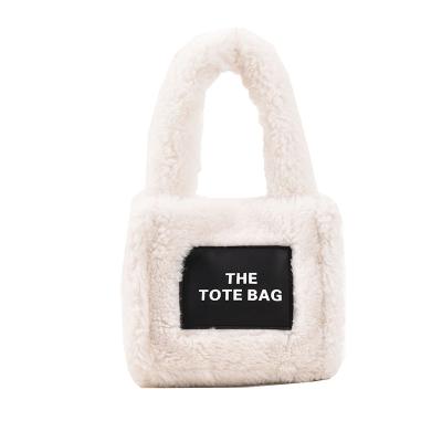 China 2022 Winter Portable Cute Plush Bags China Solid Color Ladies Fluffy Cross - Body Bags Soft Warm Faux Fur Women Purses And Wrist Bag for sale