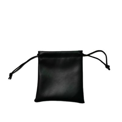 China Cool Pouch Eco-friendly PU Leather Drawstring Waterproof PU Bag With Waterproof Function for sale