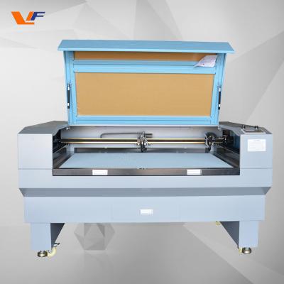 中国 100 watts laser cutter co2 wood acrylic 1390 laser cutting machine for acrylic plywood cutting co2 laser engraving 販売のため