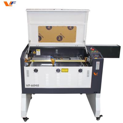 China Wood Die Cutting Machine Fiber Laser Cutter for Jewelry Laser Cutting Cnc Machine Co2 Laser 50 Watt 600*400 Cutting Area for sale