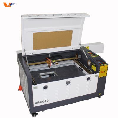 China CO2 lazer cutter cnc portable laser cutting machine mobile protector glass cutting machine 4060 co2 machine for sale