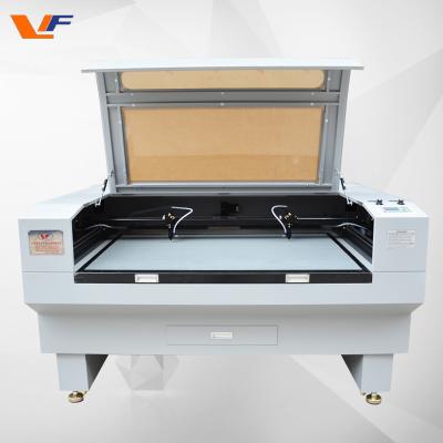 China Laser Wood Cutting Machine Co2 Laser Engraving Machine Co2 Laser Cutter for Plastic 1300*900mm Cutting Area for sale