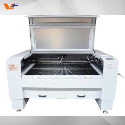 China High Speed CO2 Laser Cutting Machines Co2 Engraving Machine 1410 Laser Cutter for Rubber Plastic Wood Glass Stone en venta