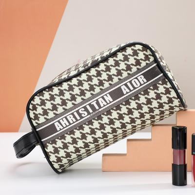 China Retro High Quality PU Travel Makeup Bag Logo Custom Cosmetic Pouch High End Leather Women Small Waterproof Wash Bag With Zipper for sale