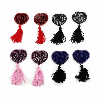 China Sexy Women Product Silicone Rhinestone Adult Sexy Nipple Cover Invisible Nipple Cover With Tassel for sale