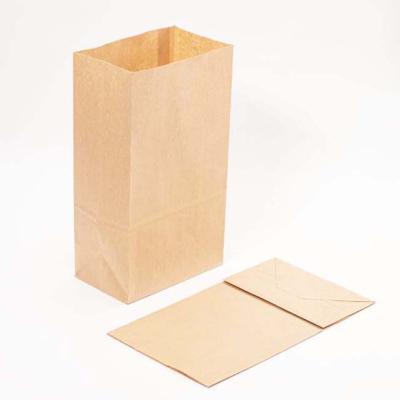 China Recyclable High Quality 100 Pcs/Bag 5.25x3.75x8 Inches Small Handles Paper Shopping Bag Kraft Party Brown Bag for sale