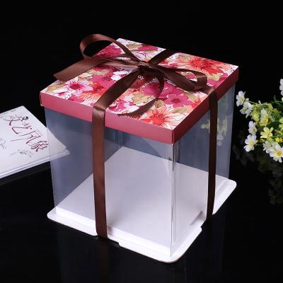 China Disposable Transparent Clear Plastic Cake Box With Ribbon And Printing Flower for sale