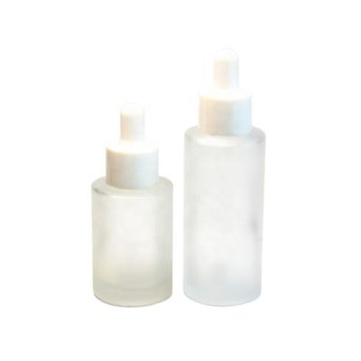 China Cosmetic 30ml 50ml Frosted Round Glass Bottles With Dropper For To Hear Essential Oil for sale