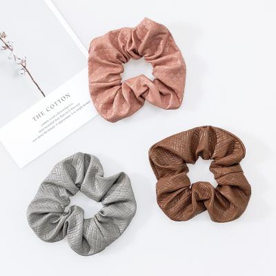 China Factory Direct Fashion Grid Fur Hair Ties Environmentally Friendly Shiny Girls Leather Hair Scrunchies For Women for sale