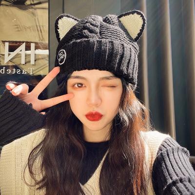 China Cute JOINT Cat Ear Curl Cap Winter Fashion Knitted Thick Wool Beanie Cap Wholesale Winter Ball Caps Hats for sale