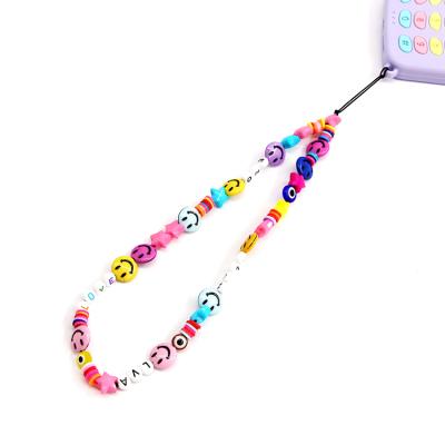 China Customized Wholesale Environmental Friendly Colorful Smile Face Decorate Girl's Phone Chain Handmade Long Chain Strap for sale