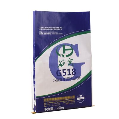 China Customized Logo Printed Low Price Full-Color Handled Printing Eco 100% PP Woven Packaging Bags For Pig Feed Food for sale