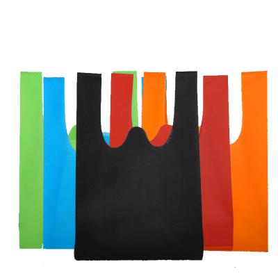 China High Quality Customized Reusable Eco - Friendly Non Woven Folding Vest Bags W Cut Non Woven T Shirt Bags For Shopping for sale