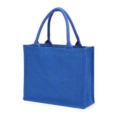 China New Cheap Handled Jute Shopping Bag Simple Design White Intaglio Printing Custom Made for sale