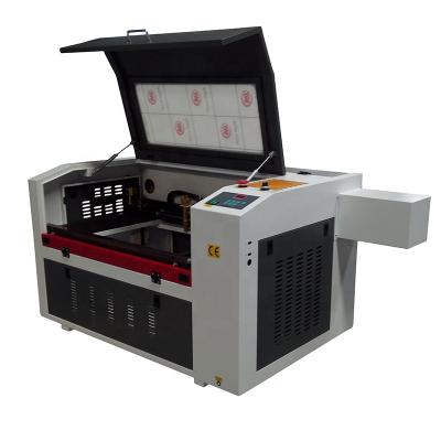 China Laser Engraving China JIN ZHI YIN 50w 60w 80w 90w Small CO2 6040 4060 600 X.400 Laser Engraving Cutting Machine Good Price for sale