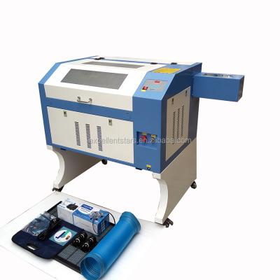 China Glass Laser Engraving 4060 50w 60w 80w 90WreciCo2 Crystal Metal Mini Laser Engraving Machine Acrylic Leather Wood Price for sale