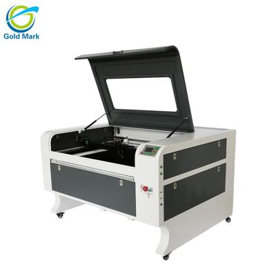 China Laser engraving machines 60w 80w 100w 130w laser cutting machine ruida water cooled 1080 controller electric up and down. for sale