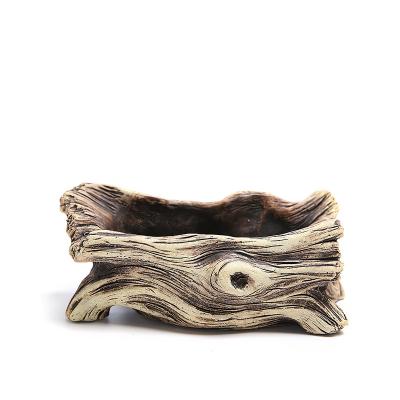 China Breathable Pastoral Wooden Stack Flower Pot Resin Flowerpot Tray Garden Planter Tree Root Succulent Flower Pot for sale