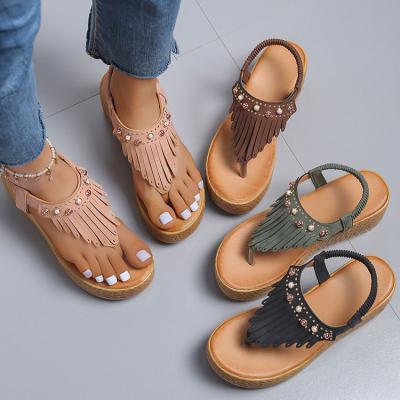 China 2022 other new summer fashion women fringed female hollow wedge sandals thong wedge sandals for sale