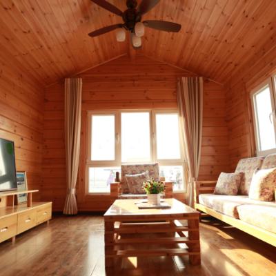 China Modern Handmade Wood Log Material Wooden Log House Use And Living Room for sale