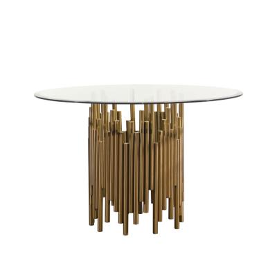 China Hot Modern Turned Tempered Glass Dining Table Gold Stainless Steel Frame Restaurant Table For Home Cafe for sale