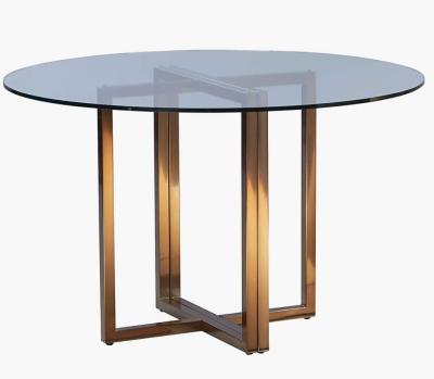 China Modern Luxury Tempered Glass Base Glass Top Stainless Steel Simple Design Round Dining Tables For Home Hotel for sale