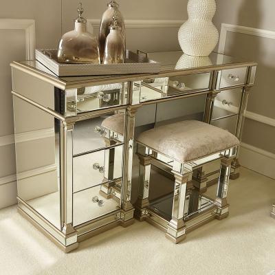 China Durable Fashionable Bedroom Furniture Mirrored 9 Drawer Dressing Table With Champagne Gold Trim for sale