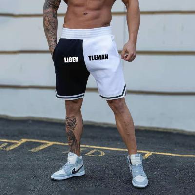 China Anti-wrinkle fashion stitching shorts casual men's sport abbreviations and Logo Boys Shorts custom made men for sale