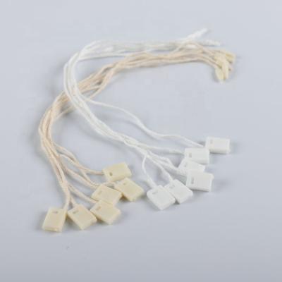 China OEM Low Price Viable Square Block Form Cotton Thread Hang Tag String Plastic Seal Tag For Garment Shoes Bag Hang Tag Accessories for sale