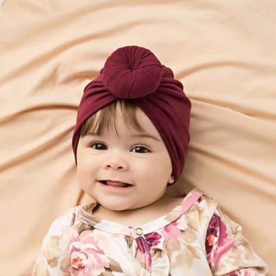 China Toddler Friendly Material Bun Headband Donut Head Wraps Elastic Soft Cotton Bun Knot Baby Girl Turban Top Headbands for sale