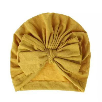 China Low Price Friendly Material Headbands Girls Tie Turban Head Wrap Solid Colors Cotton Baby Hair Bow Turban for sale