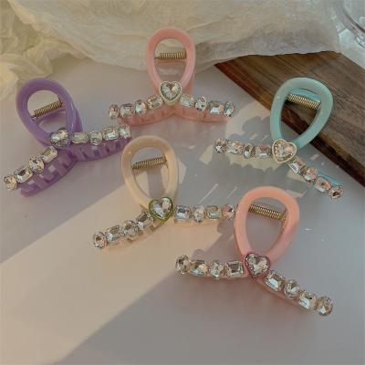 China Temperament Cross Clear Diamond Shaped Advanced Back Contact Clip Handle Love Clip Hair Claw Hair Shark Clip Headpiece for sale