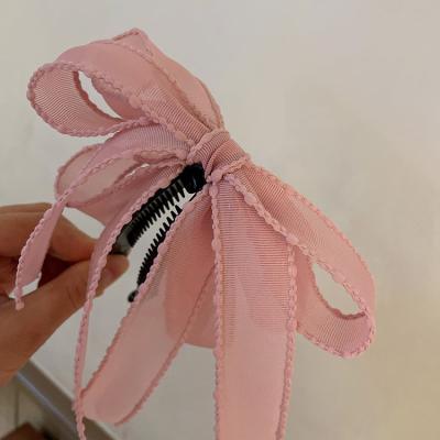 China 2023 New Spring Bow Hair Accessories Clip Fashion Vertical Handmade Cloth Clip Silk Hairpin With Multiple Colors In Stock for sale