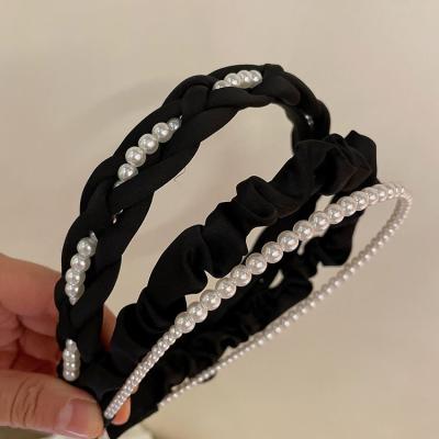 China 2023 New Fashion Trend Twist Ribbon Non-slip Cross Soft Metal Bead Chain Headband for sale