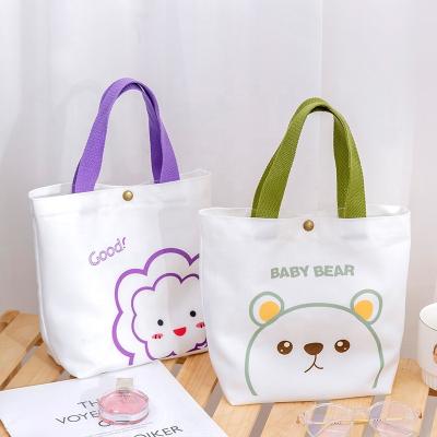 China Practical Cartoon Printing Simple Style Canvas Buttun Handbag Korean Tote Cotton Bag Bronze Canvas Tote Bag for sale