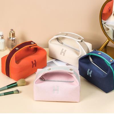 China New Pattern Travel Portable Wash Bag Women Cosmetic Portable Home Canvas Bag Pink Makeup Brushes Bag for sale