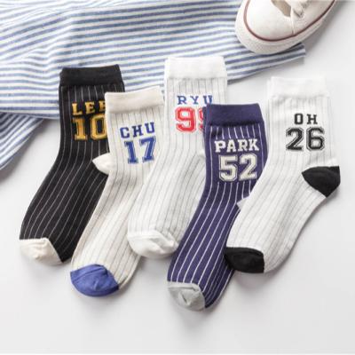 China Factory supply summer fashion sports game striped long alphanumeric printing sports socks for sale