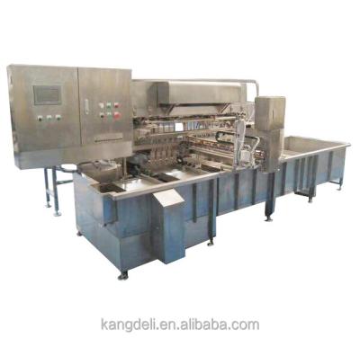 China Automatic Tofu Cutter Tofu Cutting and Packing Machine (Plastic Box) for sale