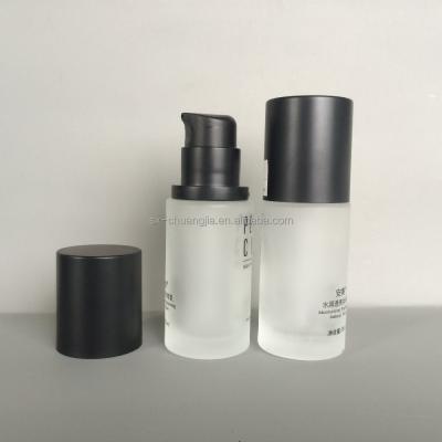 China Hot Sale 30ml Cosmetic Cosmetic Round Frosted Base Pump Glass Bottle With Cap for sale