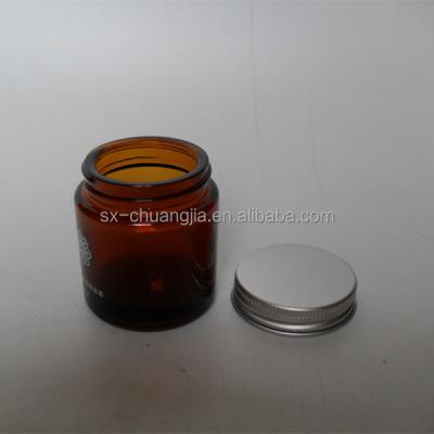 China 50g amber glass jar cream cosmetic packaging cosmetic glass jar with aluminum lid for sale