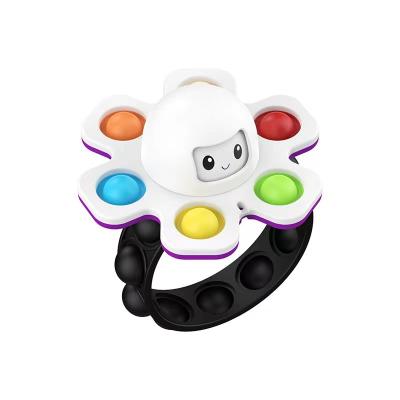 China 2022 Hot Selling Food Grade Silicone Popular Octopus Gyro Bracelet Squid Game Rotating Face-Changing Toys for sale